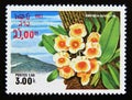 Postage stamp Laos, 1983. Orchid Dendrobium aggregatum flower Royalty Free Stock Photo