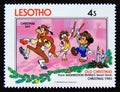 Postage stamp Lesotho 1983. Christmas Day Goofy, Donald, Mickey Royalty Free Stock Photo