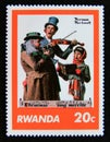 Postage stamp Rwanda, 1981. Christmas Musicians painting Norman Rockwell