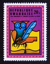 Postage stamp Rwanda, 1975. Owl, quill and book