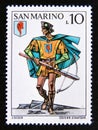 Postage stamp San Marino, 1973. Crossbowman, Pennarosa castle Royalty Free Stock Photo