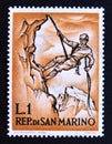 Postage stamp San Marino, 1962. Mountaineer roping landscape