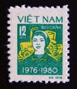 Postage stamp Vietnam, 1979. Woman and Tractor