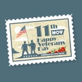 Post stamp with Soldiers holding an American flag. Veterans Day Royalty Free Stock Photo