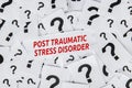 Post traumatic stress disorder text over papers