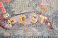 Post word composed by a mosaic of colorful stones