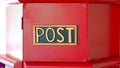 Post word sign of the red post box.