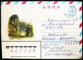 Postage envelope printed in Russia shows Forest and mountain landscape, addressed to Krasnoyarsk city, dated 1982