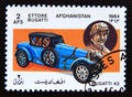 Postage stamp Afghanistan 1984. Bugatti Type 43 Sports car and Ettore Bugatti Royalty Free Stock Photo