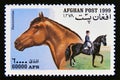 Postage stamp Afghanistan 1999. Hannoverian Equus ferus caballus horse breed Royalty Free Stock Photo