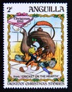 Postage stamp Anguilla 1983. Jiminy Cricket plays the violin while cooking on fire.