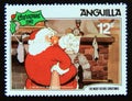 Postage stamp Anguilla 1981. Santa Claus reading wishlist Royalty Free Stock Photo