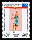 Postage stamp Cambodia 1995. Basketball athlete in action