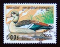 Postage stamp Cambodia, 1997. Egyptian Goose Alopochen aegyptiaca bird