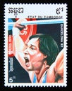 Postage stamp Cambodia 1990. Weight lifting athlete in action