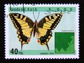 Postage stamp Cinderella, 1994. Common yellow swallowtail papilio machaon butterfly Royalty Free Stock Photo