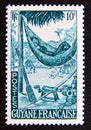 Postage stamp French Guiana, 1947. Woman Resting in a Hammock