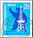 A postage stamp from Germany, Berlin showing the Berliner BÃÂ¤r with radio tower in the background. La