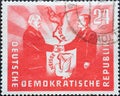 A postage stamp from Germany, GDR showing the politicians Wilhelm Pieck and BolesÃâaw Bierut in front o