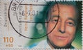 a postage stamp from Germany, showing a portrait of a portrait of the actor, director and singer Heinz RÃÂ¼hm