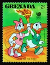 Postage stamp Grenada 1988. Donald and Daisy Duck carrying Olympic torch