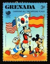 Postage stamp Grenada 1988. Donald Duck, Goofy and Mickey Mouse carrying flags Royalty Free Stock Photo