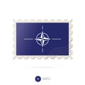 Postage stamp with the image of Nato flag