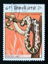 Postage stamp Laos, 1984. Indian Rock Python Python molurus snake Royalty Free Stock Photo