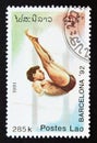 Postage stamp Laos 1991, Olympic Games Diving contestant