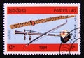 Postage stamp Laos 1984. Pipes, string instrument