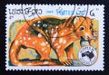 Postage stamp Laos, 1984, Tiger Quoll, Dasyurus maculatus Royalty Free Stock Photo