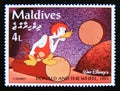 Postage stamp Maldives 1961. Donald Duck the Caveman with Log