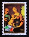 Postage stamp North Korea, 1985. The holy family, painting by Raphael Royalty Free Stock Photo