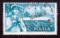 Postage stamp Poland, 1956. Officer with binoculars and freightship S.S.Kilinski Royalty Free Stock Photo