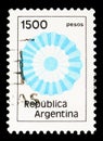 Postage stamp printed in Argentina shows National cockade, 1,500 $L - Argentine peso ley, serie, circa 1981 Royalty Free Stock Photo