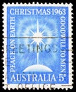 Postage stamp printed in Australia shows Bright star, globe, inscription Peace on earth, Goodwill to men, Christmas 1963 s Royalty Free Stock Photo