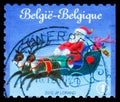 Postage stamp printed in Belgium shows Santa Claus, Reindeer, Sleigh Inland - Right imperforate, Christmas and New Year 2010 serie Royalty Free Stock Photo