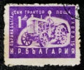 Postage stamp printed in Bulgaria shows The first tractor of Bulgaria, Economy serie, circa 1951