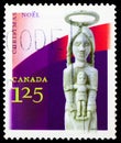 Postage stamp printed in Canada shows Mary and Child, by Irene Katak Anguititaq, Christmas, Aboriginal Art serie, circa 2002