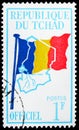 Postage stamp printed in Chad shows Country flag on map of Chad, Official issue serie, circa 1966