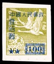 Postage stamp printed in China shows Tundra Swans over Globe, Swan Geese Anser cygnoides, Definitive serie, circa 1950