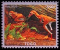 Postage stamp printed in Cinderellas shows Cryolophosaurus, Togo serie, circa 2016