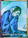 Postage stamp printed in Cinderellas shows Pablo Picasso, Drunk tired woman, Guinea serie, circa 1998