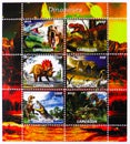 Postage stamp printed in Cinderellas shows Tyrannosaurus Rex and Triceratops Dinosaurs, Cameroon serie, circa 2016