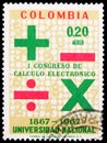 Postage stamp printed in Colombia shows Mathematic Symbols, National University Century, Electronic data processing Congress serie