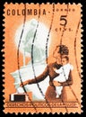 Postage stamp printed in Colombia shows Mother and Children, Issued to publicize women`s political rights serie, 5 Colombian Royalty Free Stock Photo