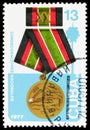 Postage stamp printed in Cuba shows Medal 20 years of the Revolutionary Armed Forces, National Decorations serie, circa 1977