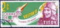 Postage stamp printed in Cuba shows portrait of cosmonaut German Titov, spacecraft-satellite `Vostok-2`