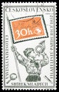 Postage stamp printed in Czechoslovakia shows Pioneer and Philatelic Symbols, Stamp exhibition of Young Philatelist PARDUBICE 1957