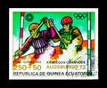 Postage stamp printed in Equatorial Guinea shows Canoe slalom C2, Summer Olympics 1972, Munich: Events in Augsburg serie, circa